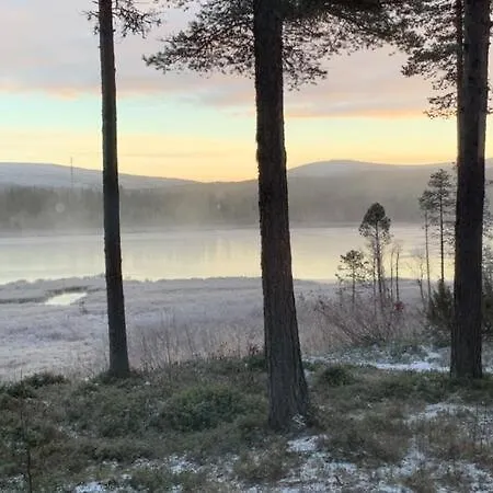 Kaupinmaja, Yllaes, Aekaeslompolo, Lapland - Log With And Fell Scenery