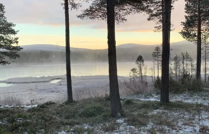 Kaupinmaja, Yllaes, Aekaeslompolo, Lapland - Log With And Fell Scenery