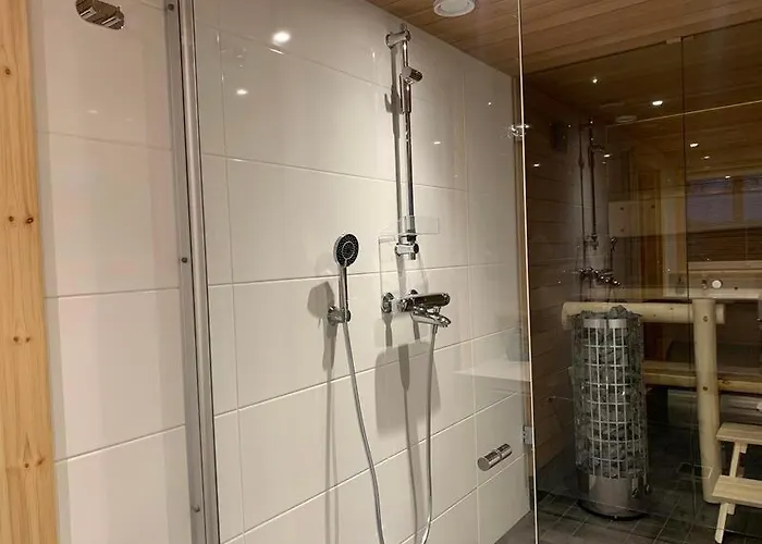 Kaupinmaja, Yllaes, Aekaeslompolo, Lapland - Log With And Fell Scenery *